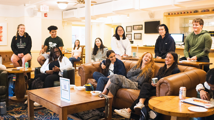 Honors students sitting in Collis having a discussion