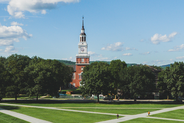 A shot of baker tower at a distance with a blue sky. 