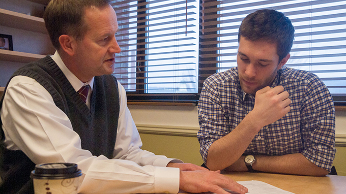 Roger Woolsey from the Center for Professional Development speaking to Samuel Farnham, Class of 2014