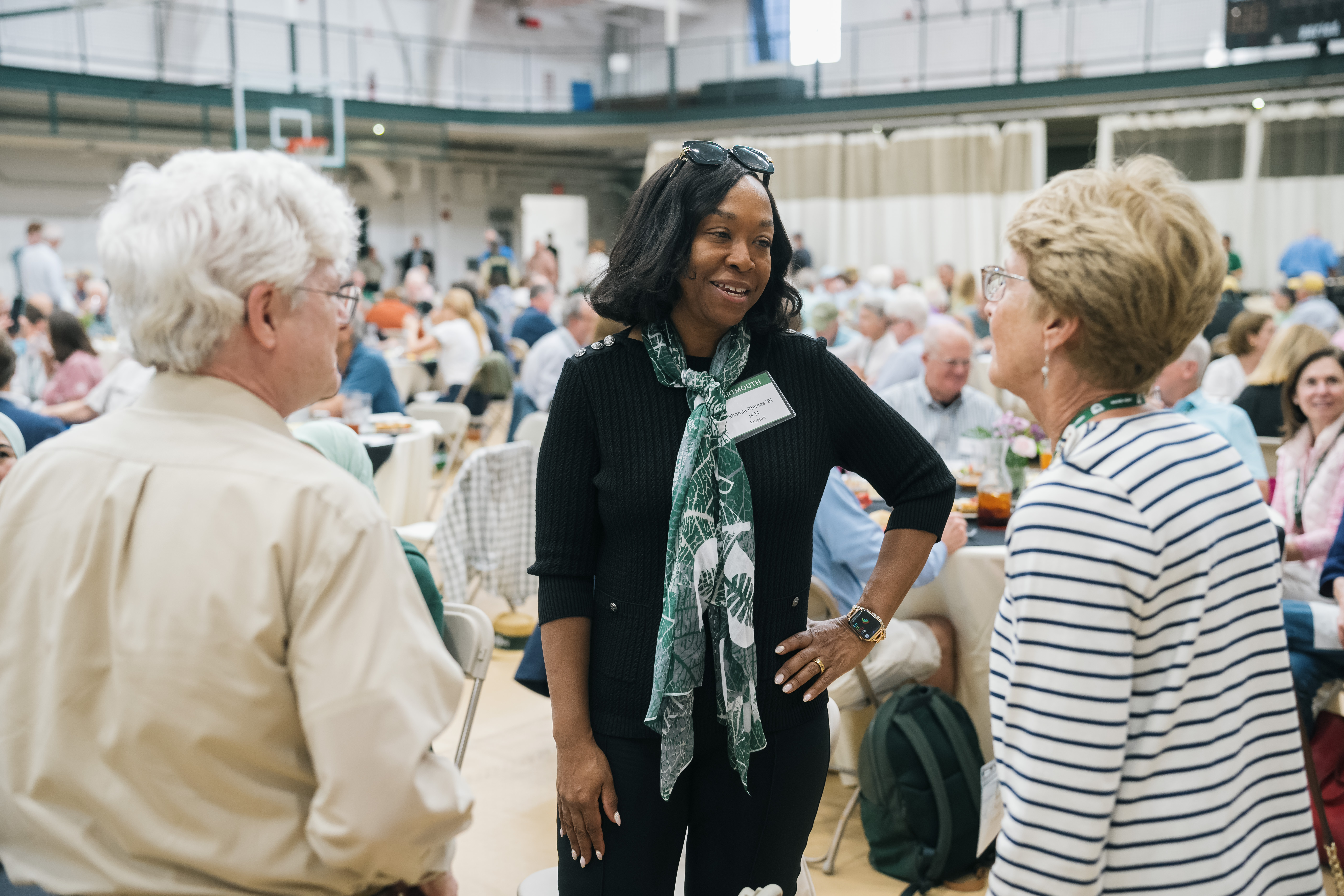 Shonda Rhimes talking to two other alumni at the 50th reunion luncheon.