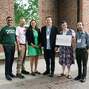 A group of DGALA members posing for a photo with President Sian Beilock. 