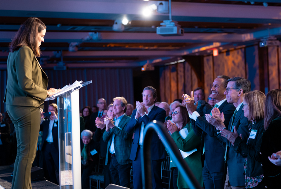 President Beilock at podium in front of standing ovation